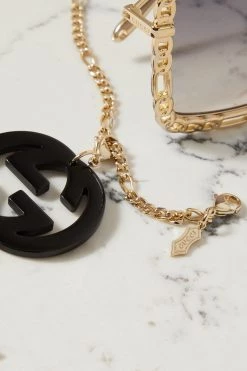 GUCCI EYEWEAR Goldfarbene Oversized-Sonnenbrille Mit Eckigem Rahmen Und Verzierung -Gucci Verkäufe w920 q60 2754