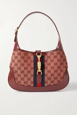 GUCCI Jackie 1961 Kleine Schultertasche Aus Beschichtetem Canvas Und Strukturiertem Leder Mit Webband ,Burgunder